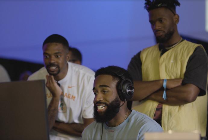 People gaming at a .SWOOSH event